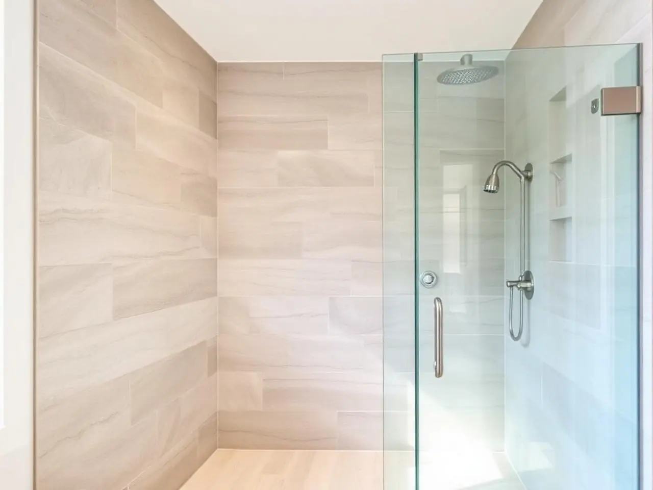 Tile repair in Boca Raton master shower with freshly regrouted large format stone tile walls